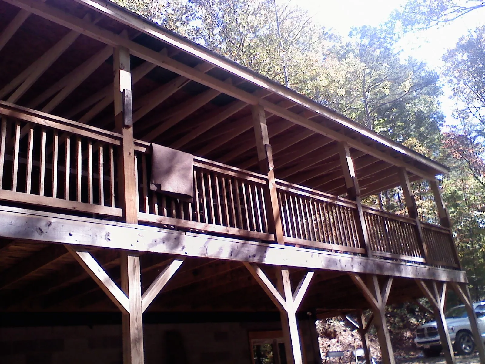 Timber framing under a new elevated porch and deck — Roof Leak Repair in Halsey by Roofing Brothers
